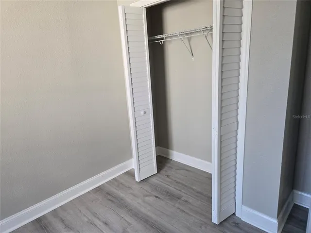 a view of small space with wooden floor