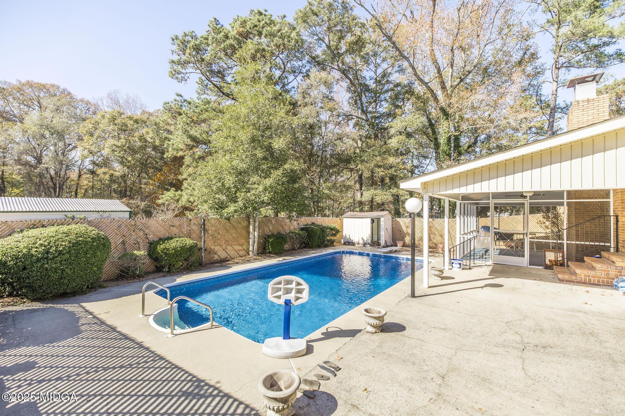 5812 Sardis Church Road Macon, GA 31216 - Photo 27 of 43 a view of a chairs and table in the patio