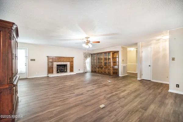 a kitchen with stainless steel appliances granite countertop a stove and a microwave