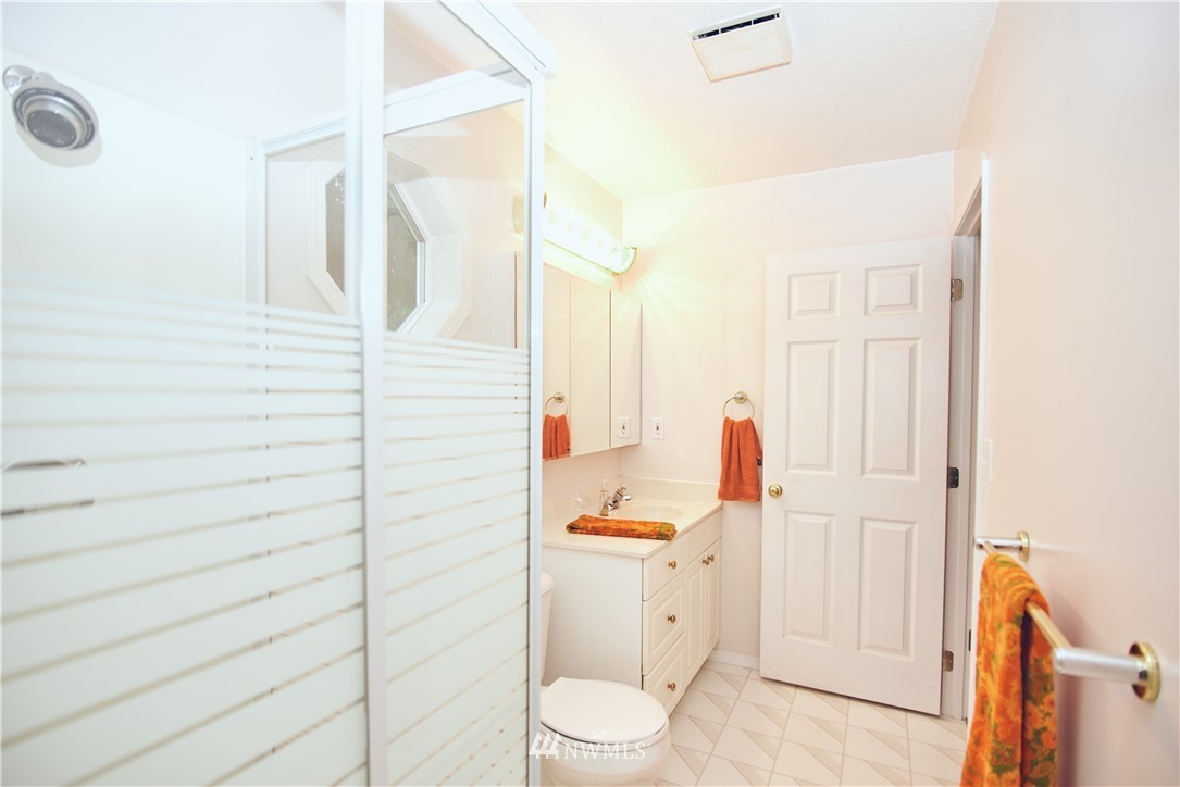 1966 Raleigh Drive Point Roberts, WA 98281 - Photo 13 of 21 a bathroom with a toilet and a shower