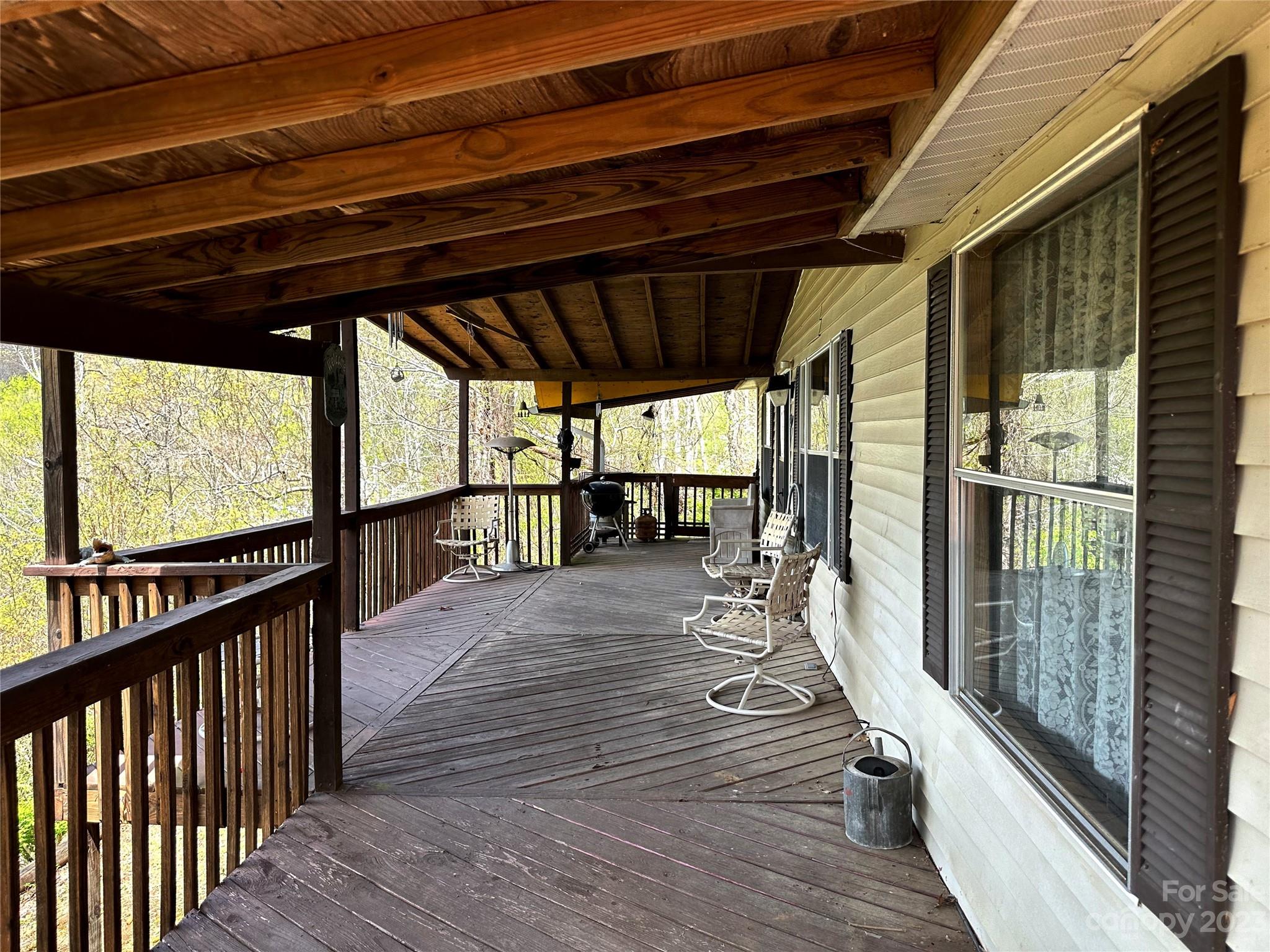 507 Matthew Lane Canton, NC 28716 - Photo 3 of 14 a view of porch with wooden floor