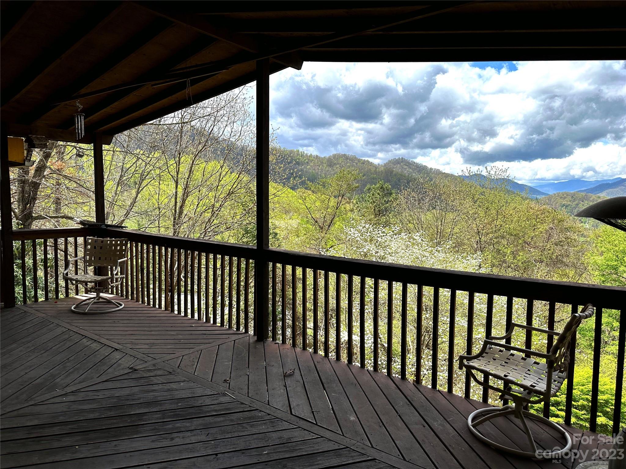 507 Matthew Lane Canton, NC 28716 - Photo 4 of 14 a view of a porch with wooden floor