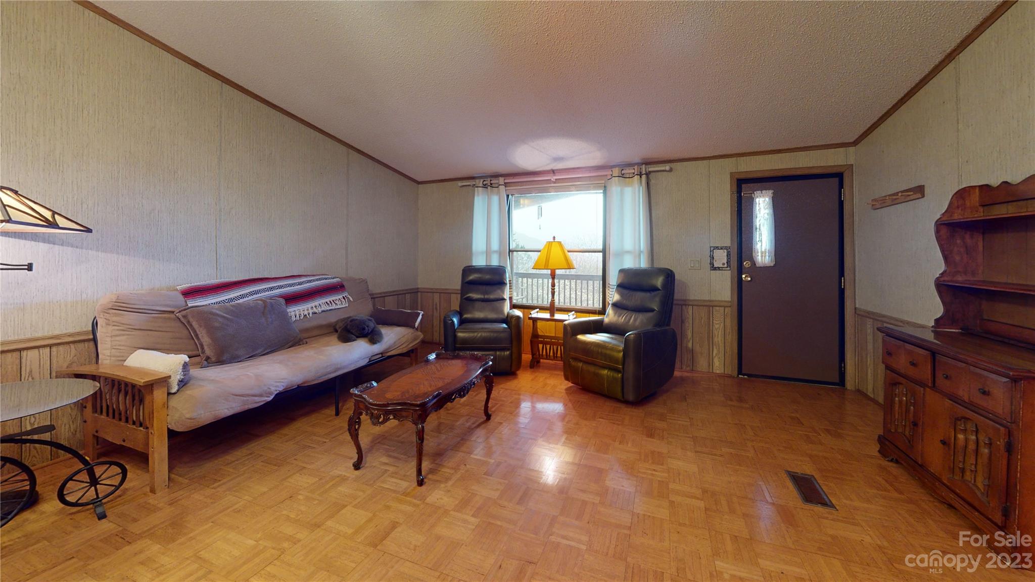 507 Matthew Lane Canton, NC 28716 - Photo 6 of 14 a living room with furniture and a window