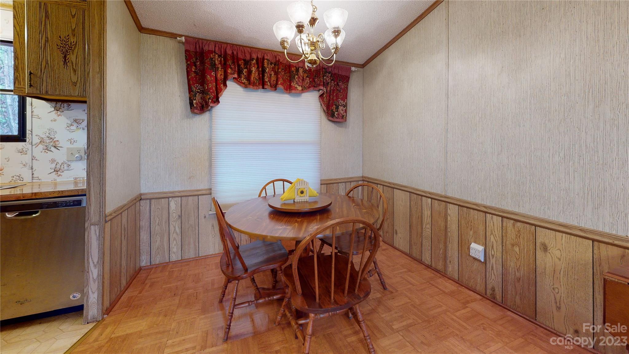 507 Matthew Lane Canton, NC 28716 - Photo 7 of 14 a view of a dining room with furniture and chandelier