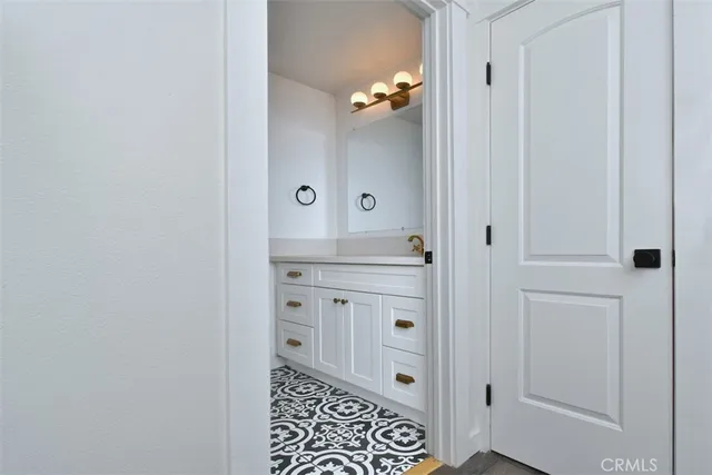 a bathroom with a shower and a sink