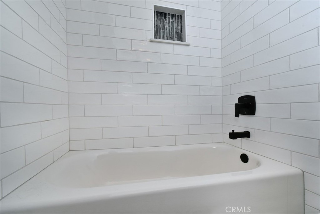 28159 Robin Avenue Saugus, CA 91350 - Photo 30 of 42 a bathroom with a bathtub