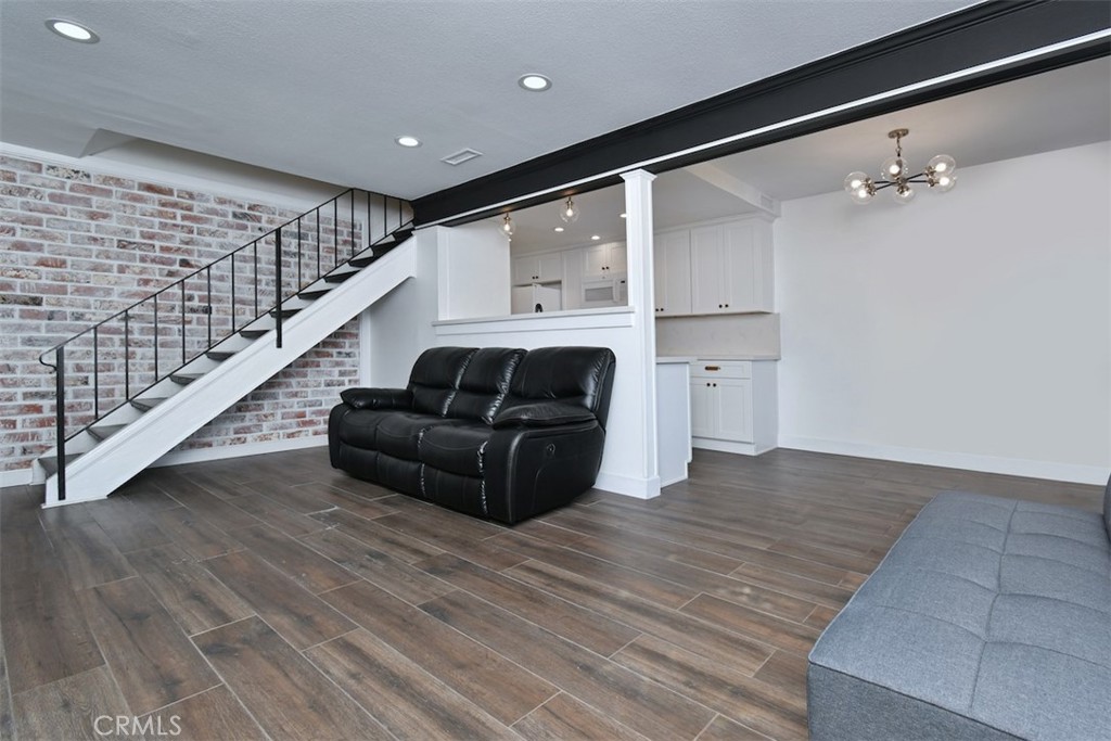 28159 Robin Avenue Saugus, CA 91350 - Photo 5 of 42 a living room with furniture and wooden floor