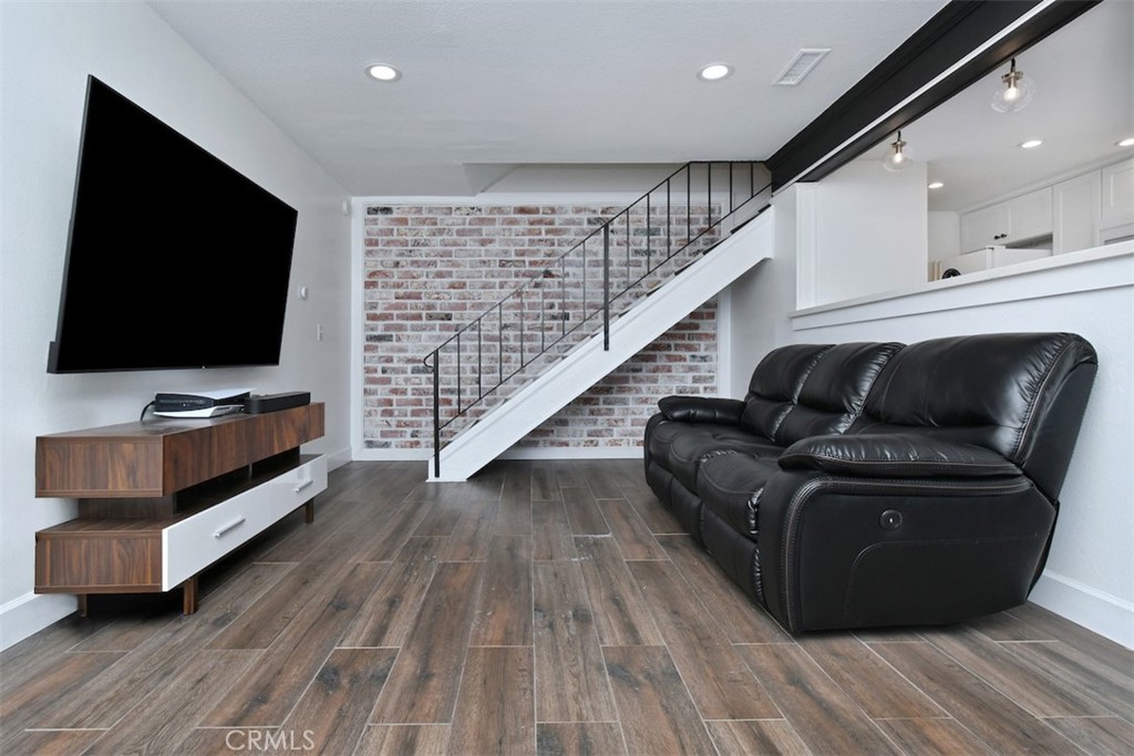 28159 Robin Avenue Saugus, CA 91350 - Photo 6 of 42 a living room with furniture and a flat screen tv