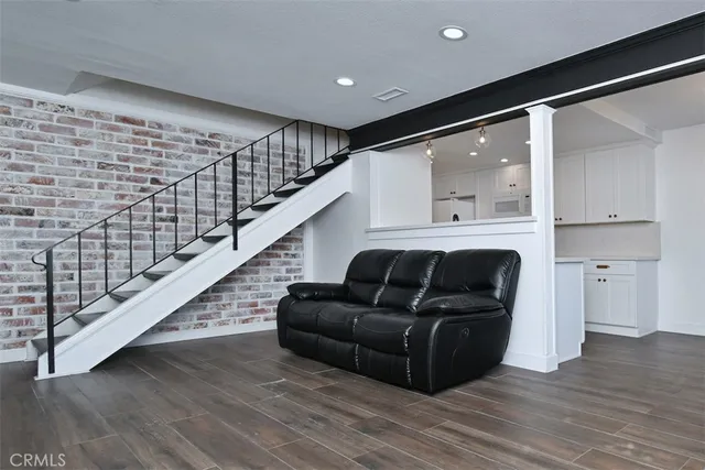 a living room with wooden floor