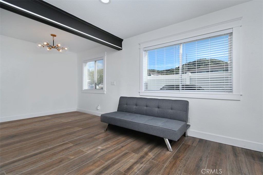 28159 Robin Avenue Saugus, CA 91350 - Photo 9 of 42 a living room with furniture and a window