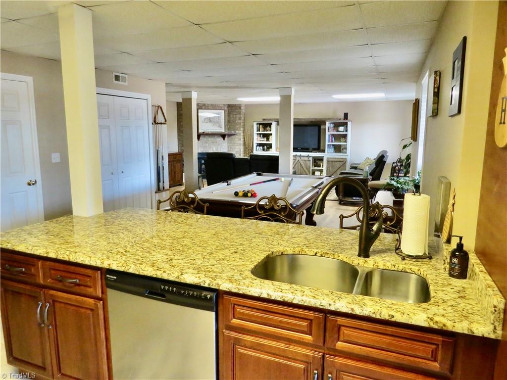 3016 Iron Works Road Reidsville, NC 27320 - Photo 34 of 50 Kitchen with exterior door to patio area