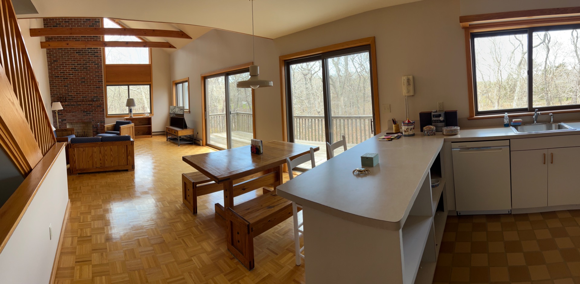 82 Oyster Pond Road Edgartown, MA 02539 - Photo 13 of 53 a living room with furniture and large windows
