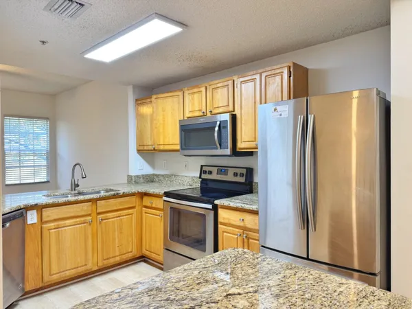 a view of a chandelier in a room