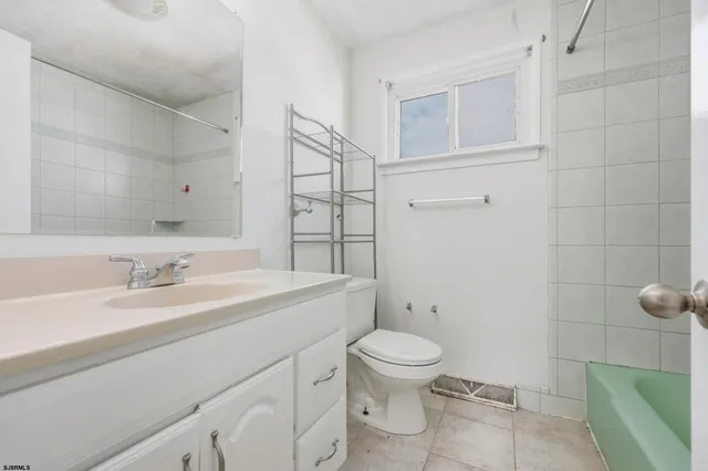 a view of a backyard with sitting area