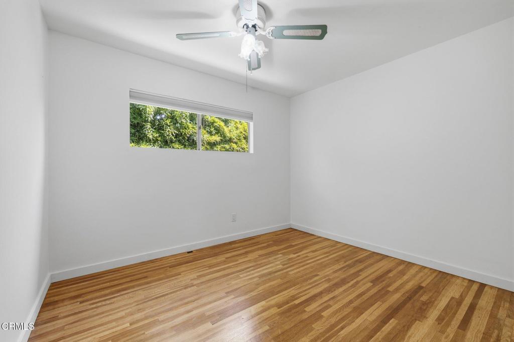13934 Aztec Street Sylmar, CA 91342 - Photo 11 of 41 a view of empty room with wooden floor