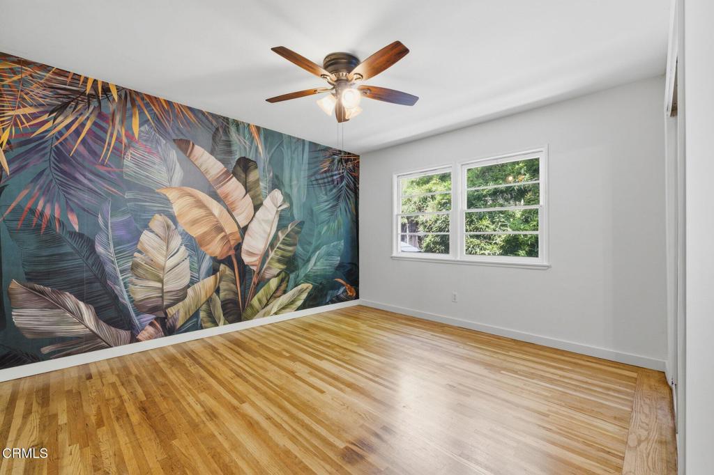 13934 Aztec Street Sylmar, CA 91342 - Photo 13 of 41 a view of a room with window and ceiling fan