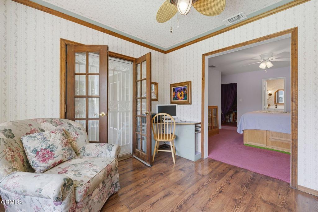 13934 Aztec Street Sylmar, CA 91342 - Photo 31 of 41 a bedroom with furniture and a wooden floor
