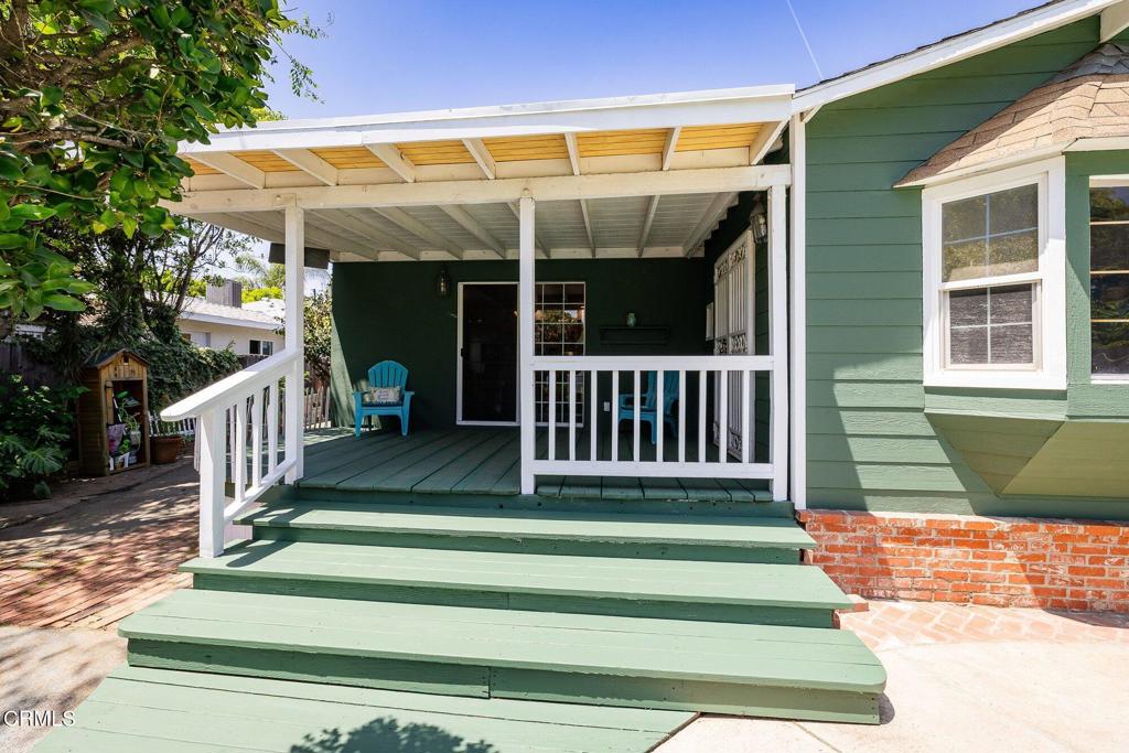 13934 Aztec Street Sylmar, CA 91342 - Photo 41 of 41 a view of a porch with a floor to ceiling window and stairs