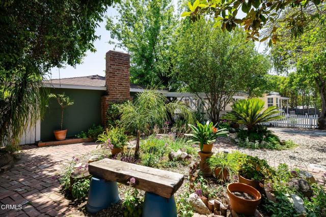 13934 Aztec Street Sylmar, CA 91342 - Photo 5 of 41 a view of a house with a yard and sitting area