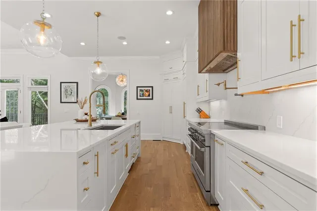 a living room with a large window and a table