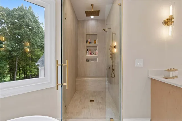 a view of a dining room with furniture window and outside view
