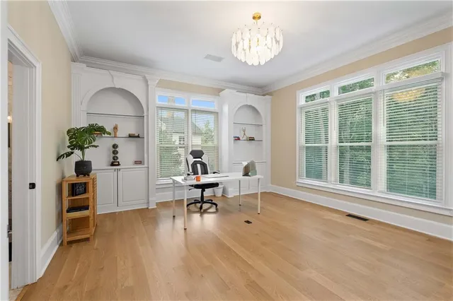 a view of backyard with swimming pool and patio