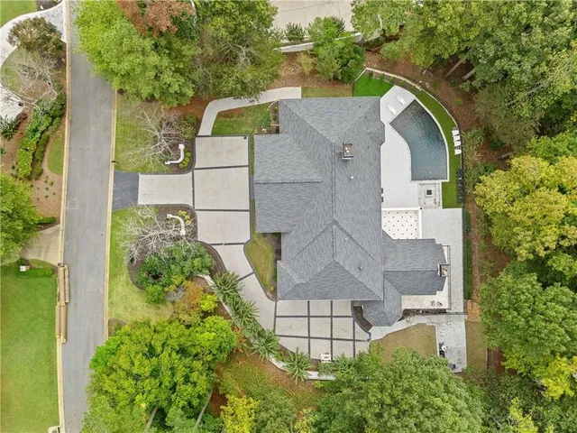 a view of an entryway with wooden floor and a livingroom view