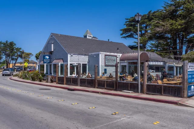 a front view of a building with street view