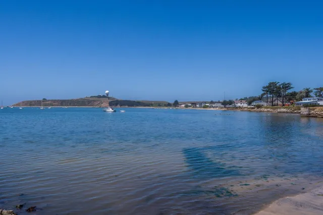 a view of an ocean with beach