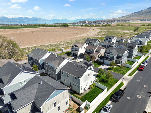 5155 East Rio Grande Way Eagle Mountain, UT 84005 - Photo 36 of 40 Aerial perspective of suburban area with a mountainous background