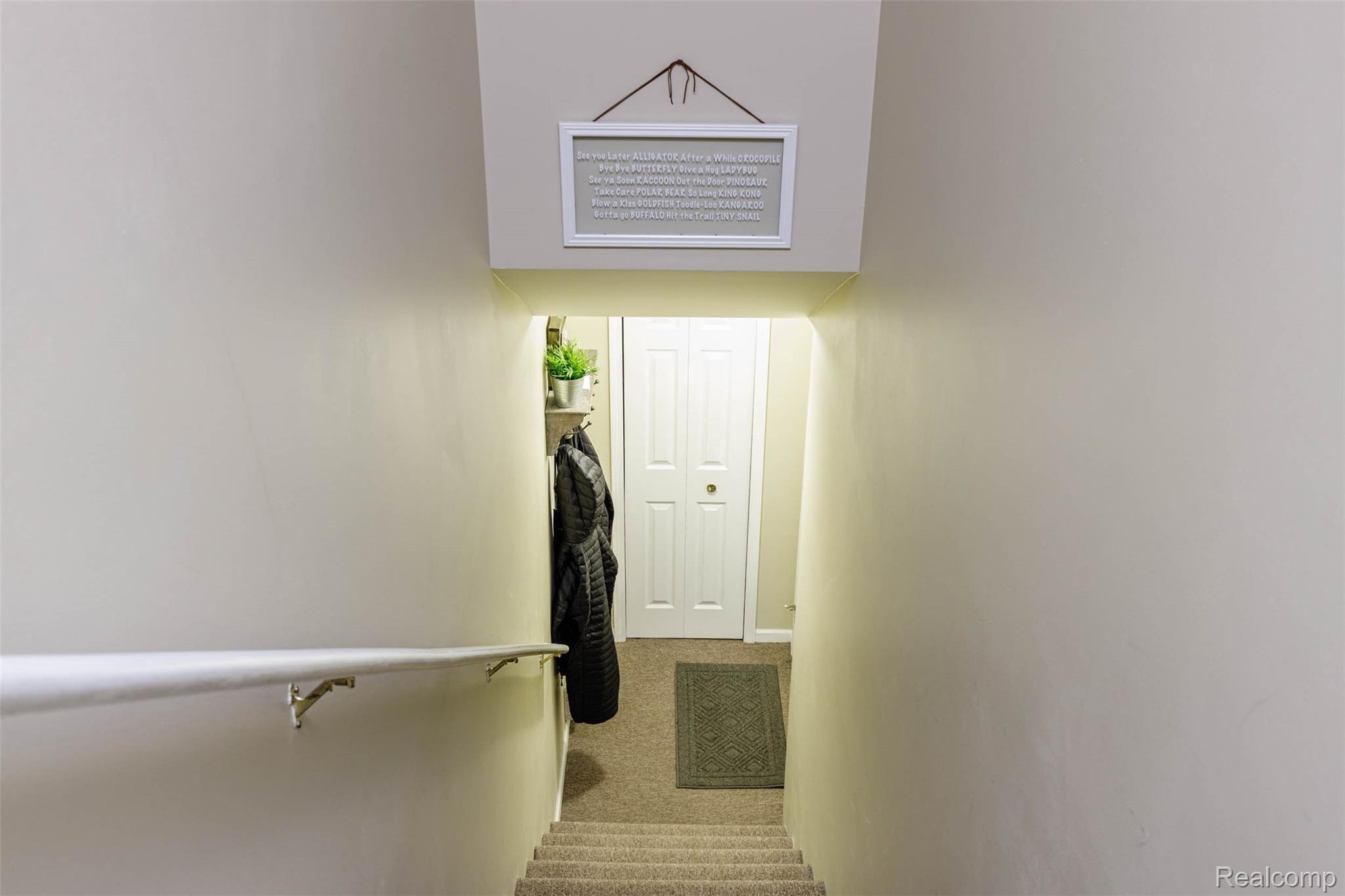 3370 Tremonte Circle, Unit 185 Rochester, MI 48306 - Photo 15 of 34 3370 Tremonte Cir Garage Entrance.jpg