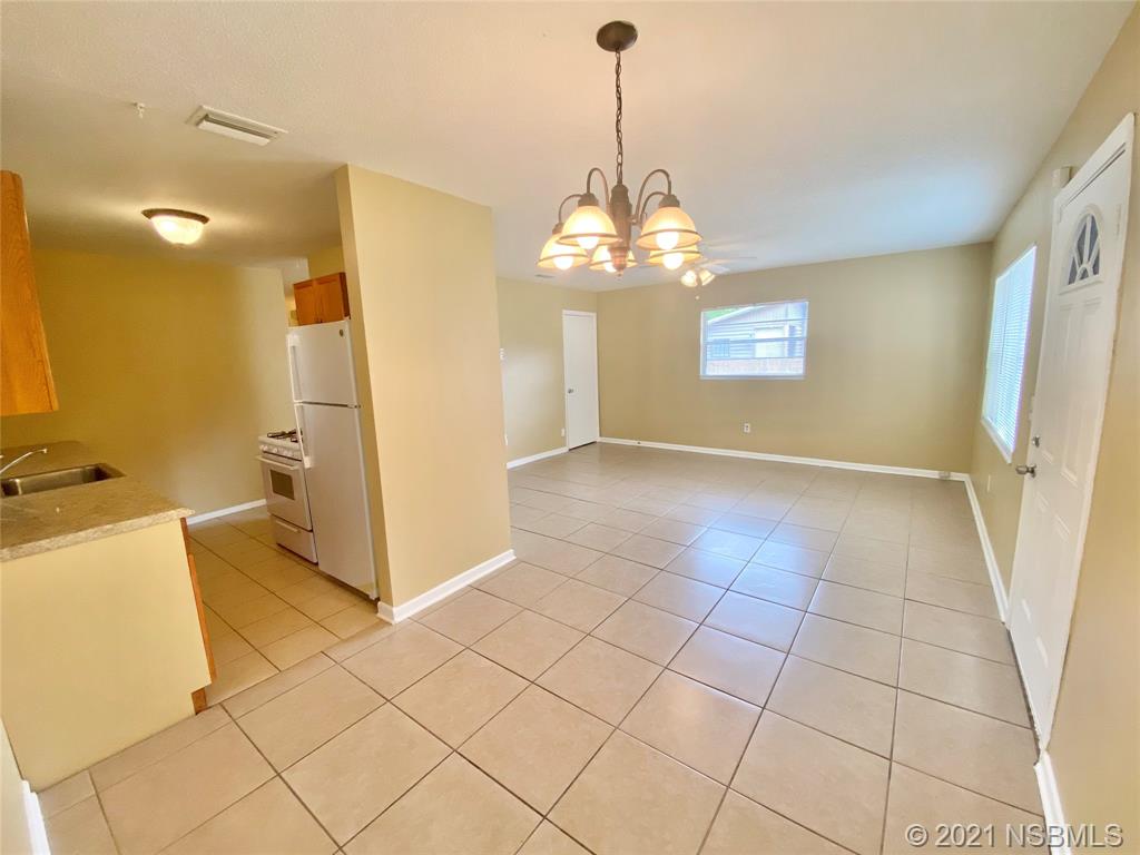 205 West Division Street DeLand, FL 32720 - Photo 6 of 15 a view of a livingroom with a furniture
