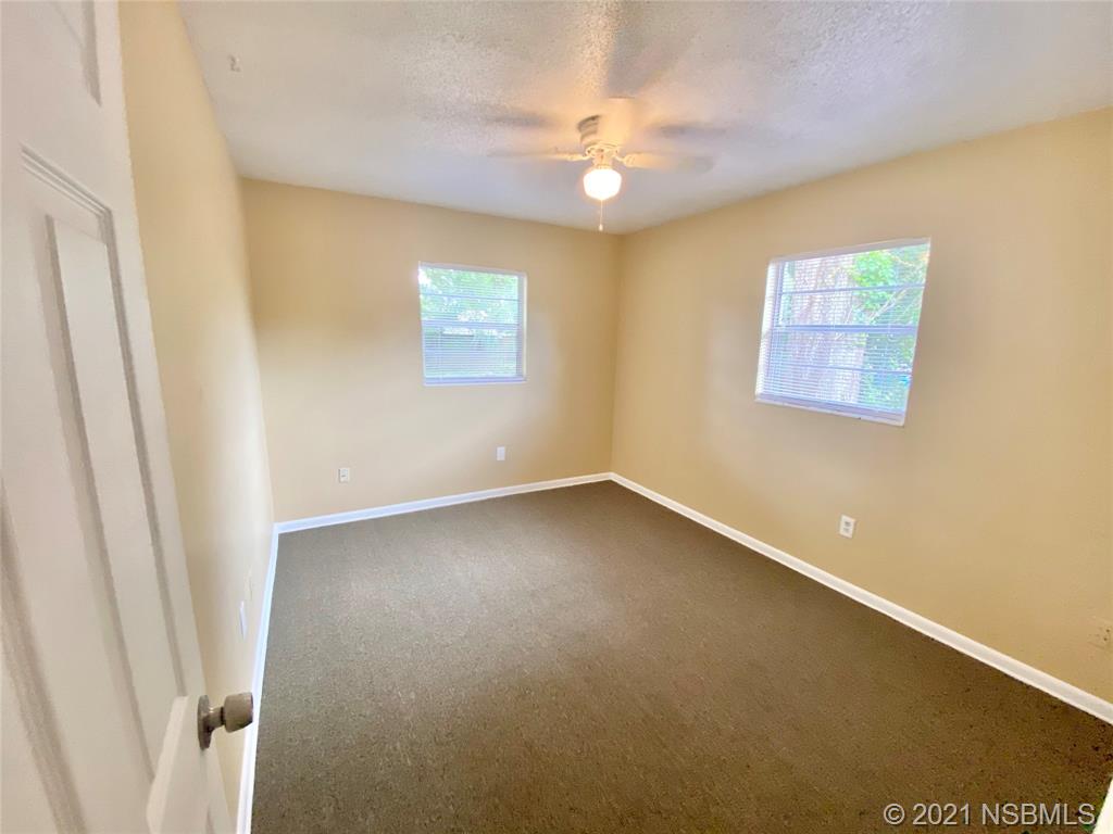 205 West Division Street DeLand, FL 32720 - Photo 9 of 15 an empty room with a window