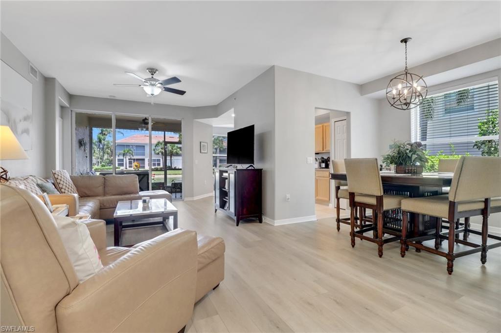 11601 Navarro Way, Unit 2102 Fort Myers, FL 33908 - Photo 10 of 25 Living room featuring light wood-type flooring and a ceiling fan