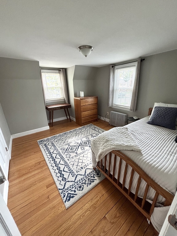 253 Gillette Avenue Springfield, MA 01118 - Photo 19 of 26 a bedroom with a bed and window