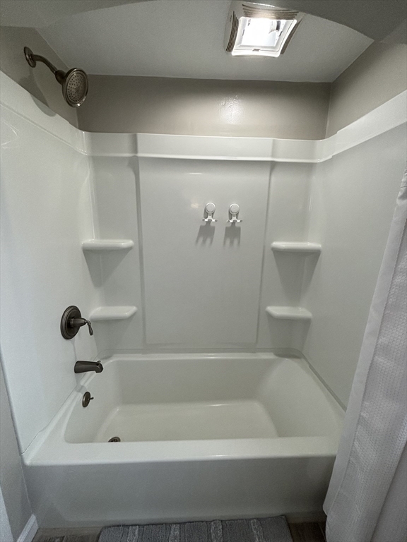 253 Gillette Avenue Springfield, MA 01118 - Photo 23 of 26 a bathroom with a bathtub