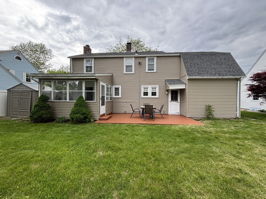 253 Gillette Avenue Springfield, MA 01118 - Photo 26 of 26 a front view of house with yard and outdoor seating
