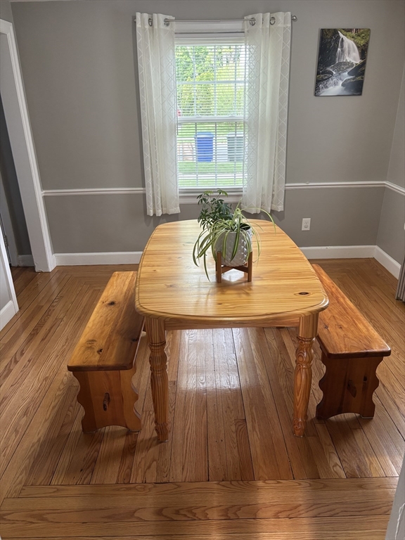 253 Gillette Avenue Springfield, MA 01118 - Photo 5 of 26 a view of a dining room with furniture and wooden floor