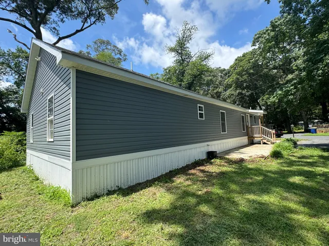 a view of a back yard of the house