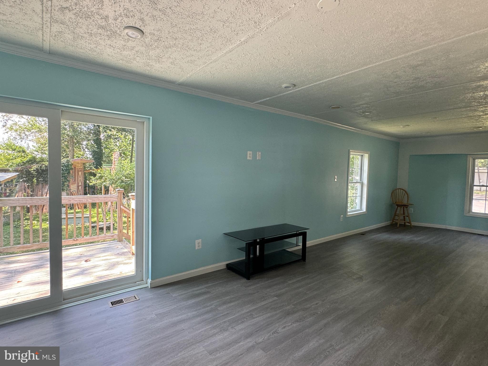 10130 Cherry Street Laurel, DE 19956 - Photo 20 of 47 a view of a room with wooden floor and window