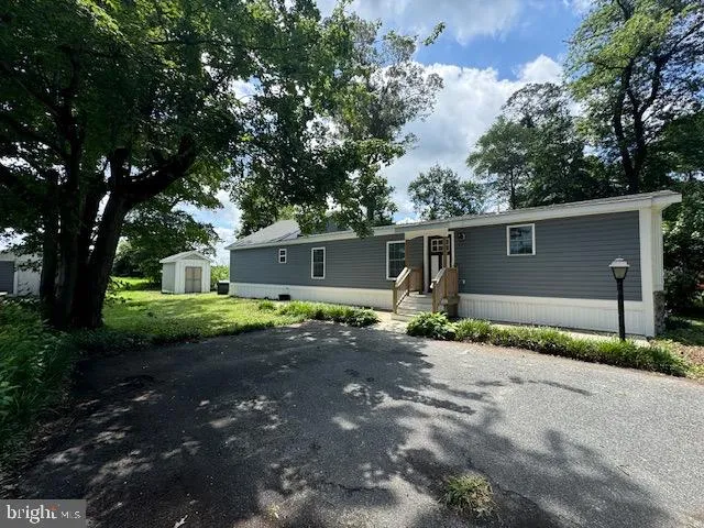 front view of a house with a street