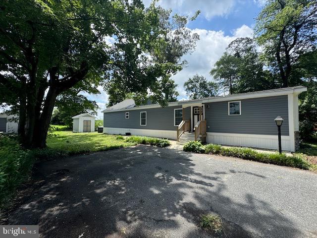 10130 Cherry Street Laurel, DE 19956 - Photo 23 of 47 a view of a house with a yard