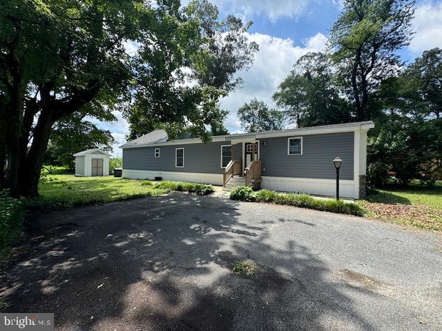 10130 Cherry Street Laurel, DE 19956 - Photo 24 of 47 front view of a house with a street