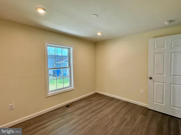 a bathroom with a sink and vanity