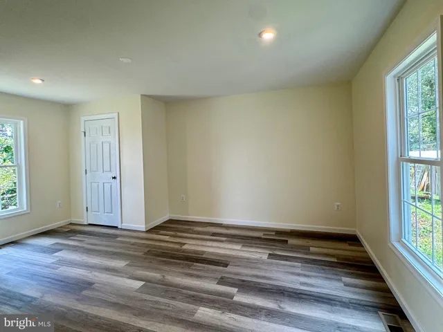 a bathroom with a toilet and a sink