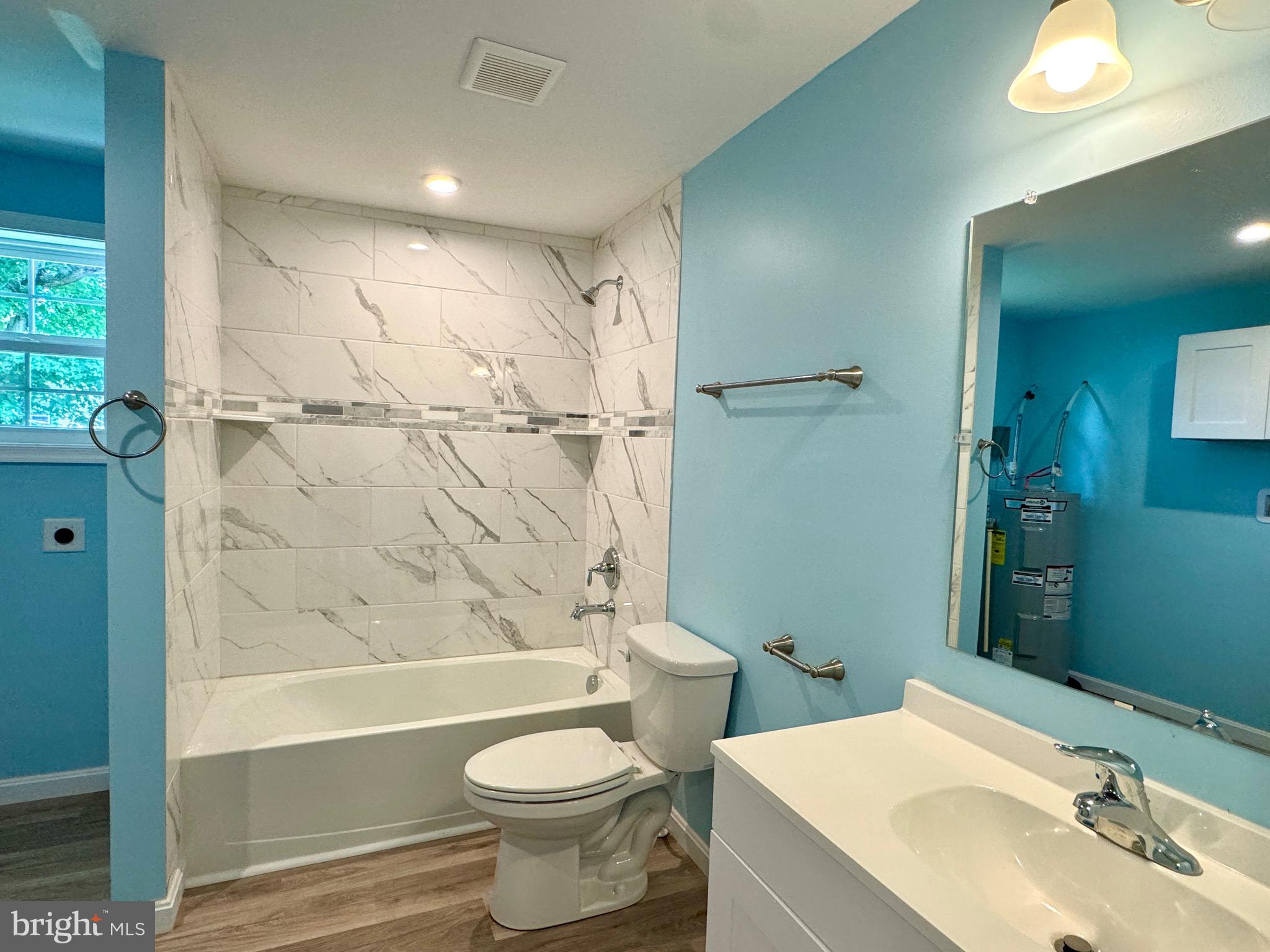 10130 Cherry Street Laurel, DE 19956 - Photo 38 of 47 a bathroom with a sink a toilet and shower