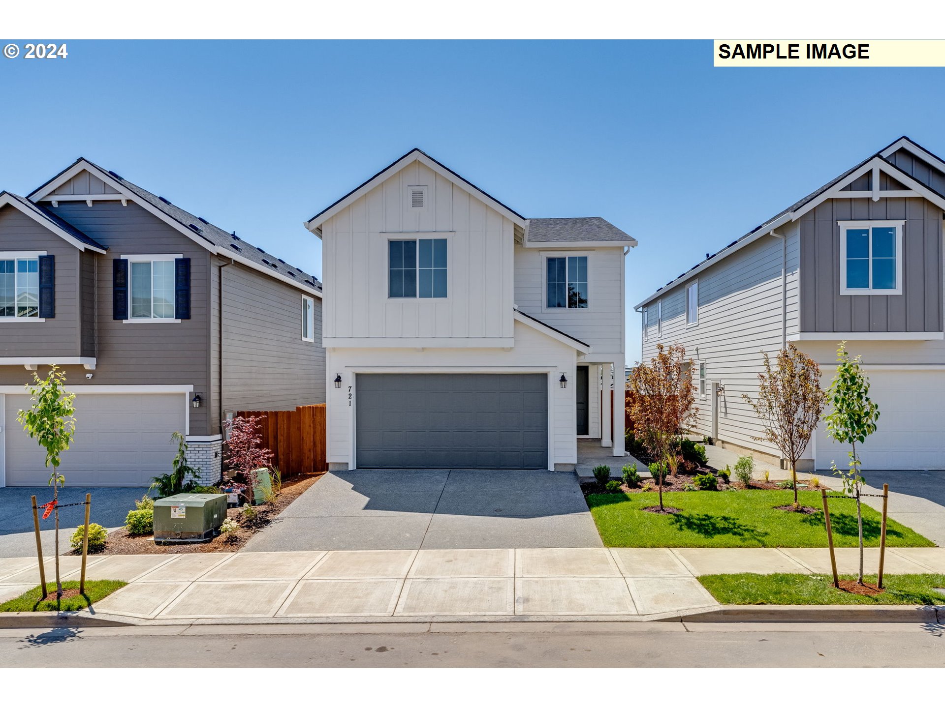 737 Northwest 178th Street Ridgefield, WA 98642 - Photo 1 of 39 a front view of a house with a yard and garage