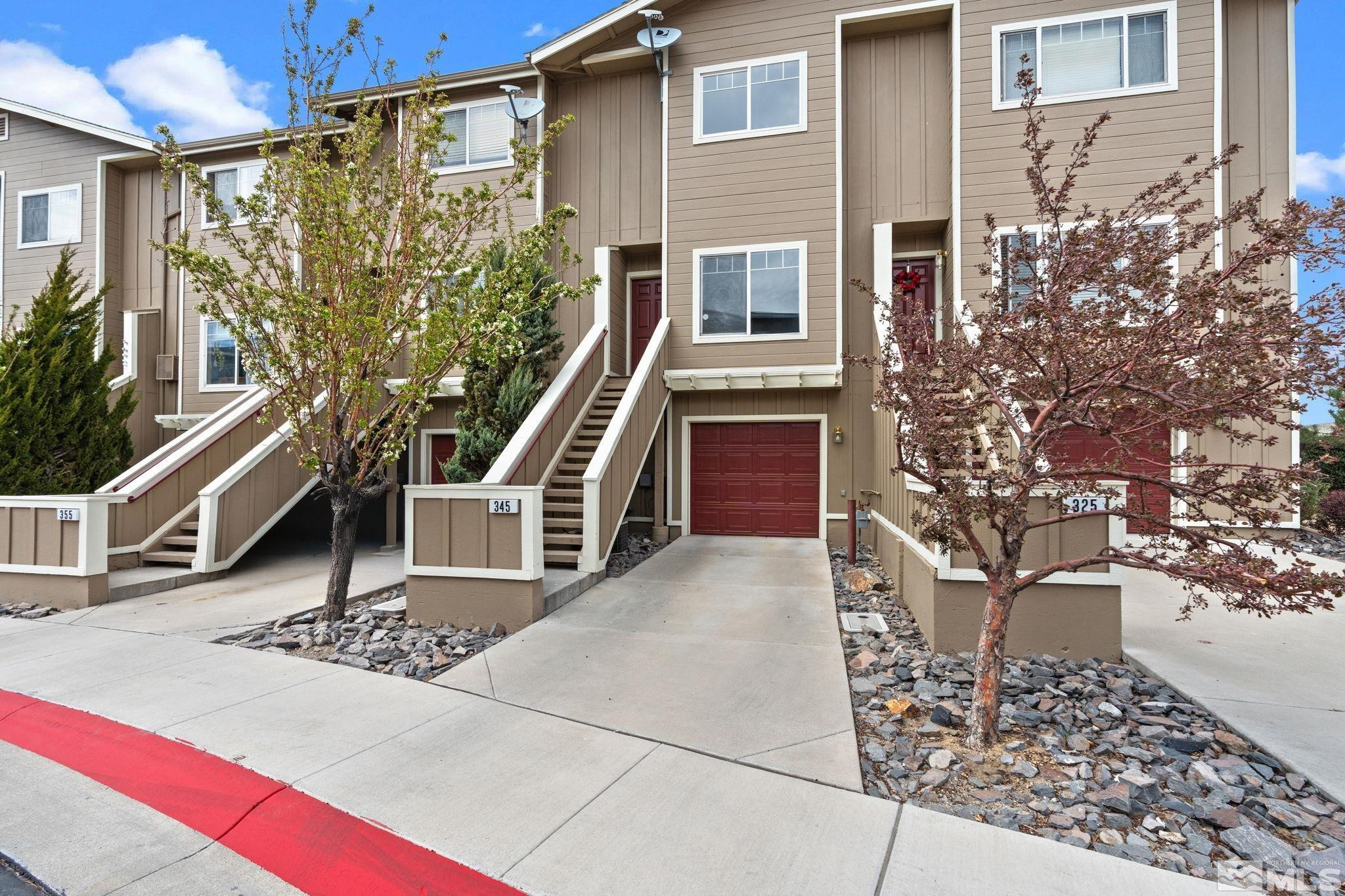 345 Madison Marie Lane Reno, NV 89503 - Photo 1 of 34 a view of an outdoor space with a street