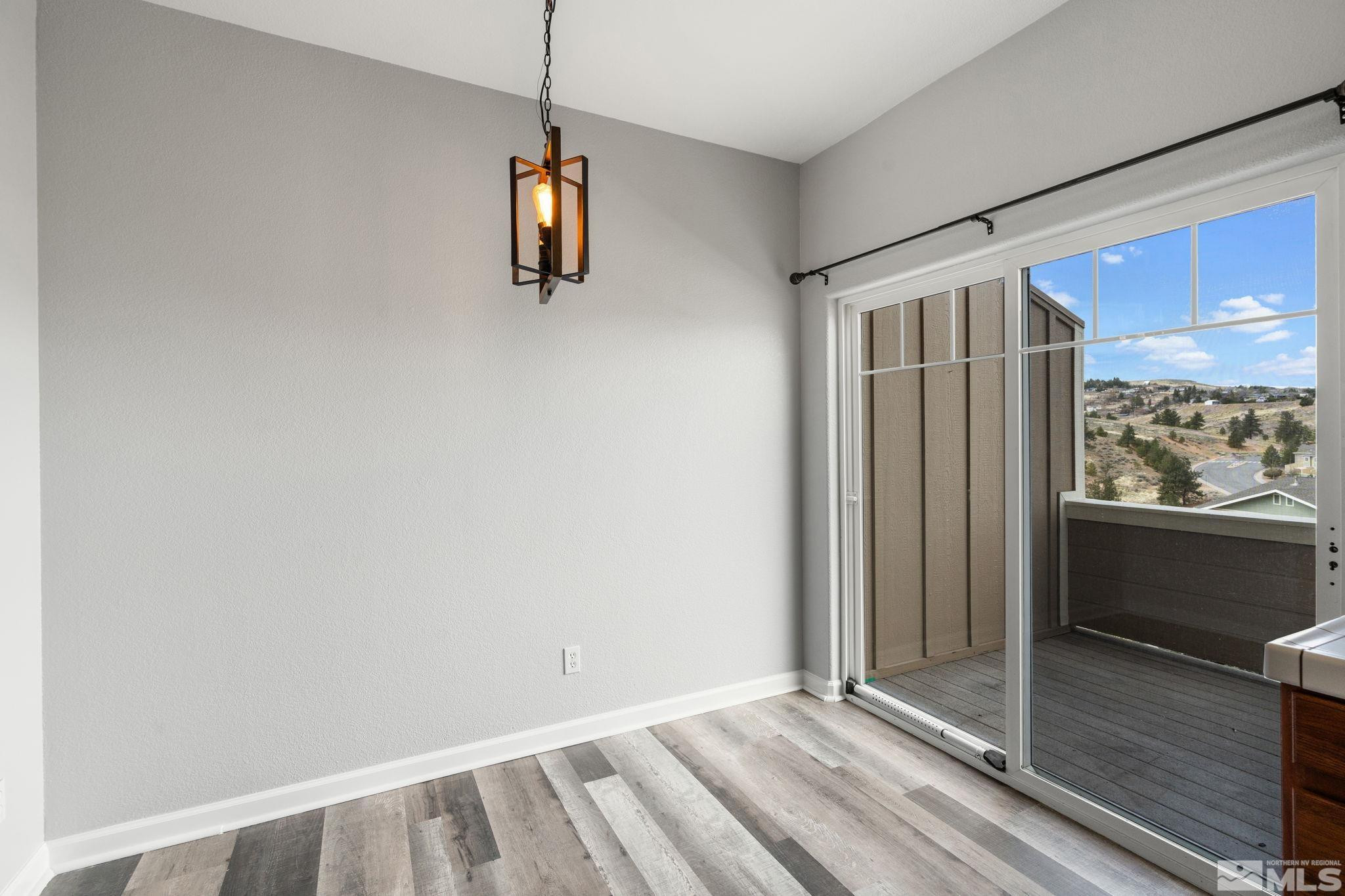 345 Madison Marie Lane Reno, NV 89503 - Photo 11 of 34 a view of an empty room with a window