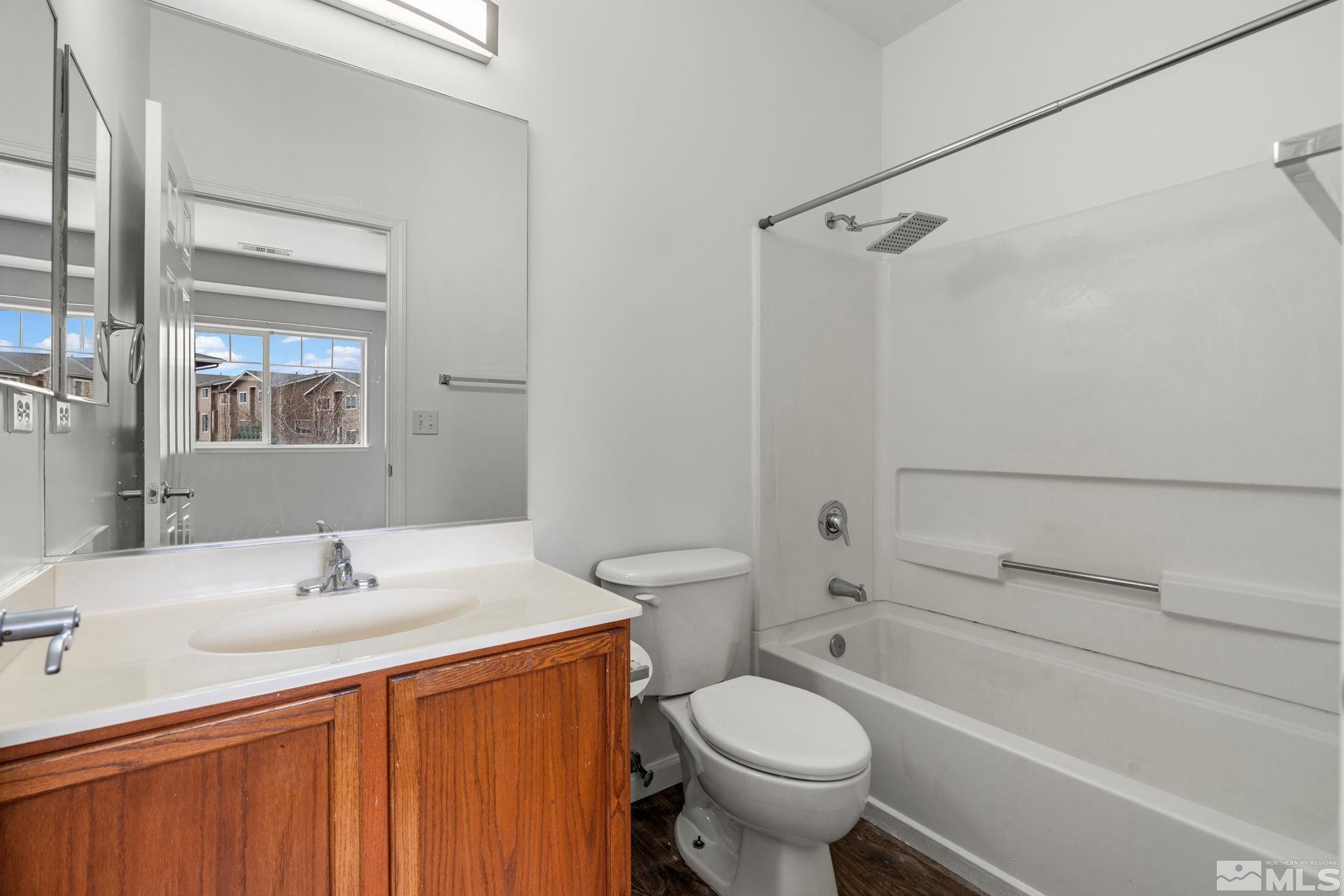 345 Madison Marie Lane Reno, NV 89503 - Photo 26 of 34 a bathroom with a sink toilet and shower